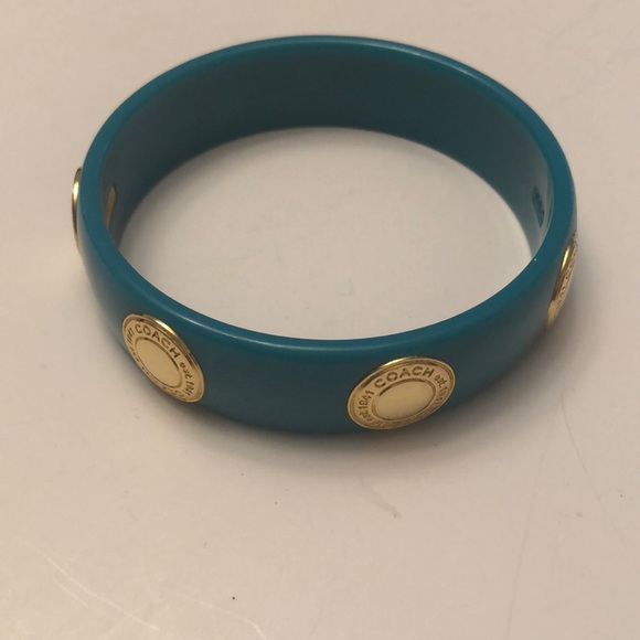 Coach Jewelry - Coach blue bangle with gold medallions